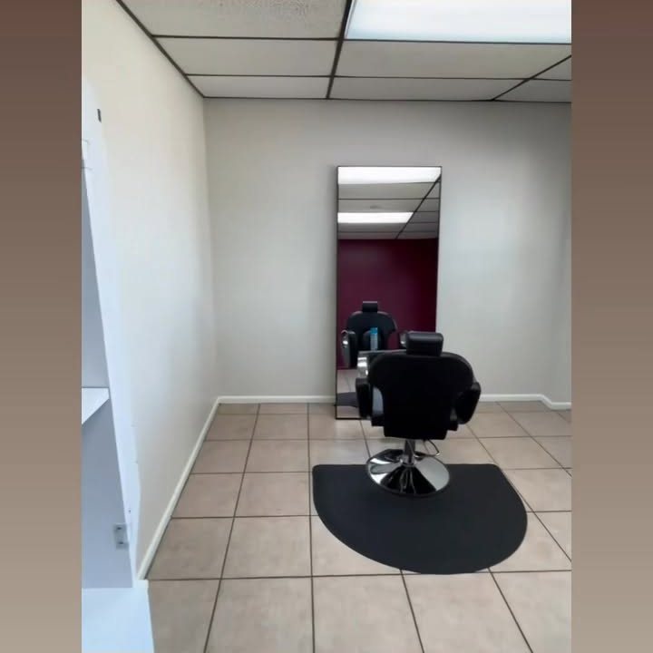 Michael's suite inside Northeast Studios: one styling chair in front of a mirror