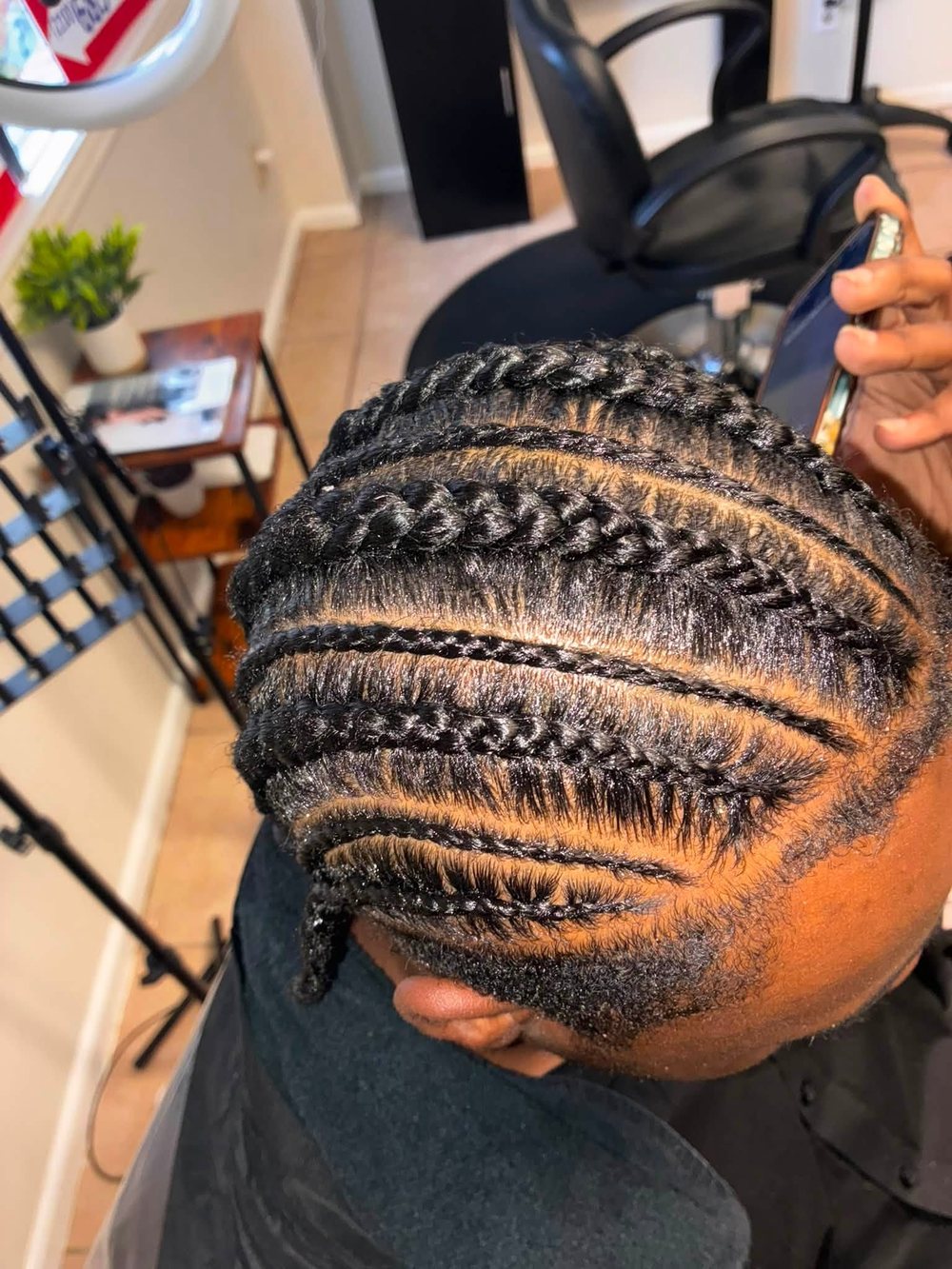 Fresh cornrows with clean straight parts